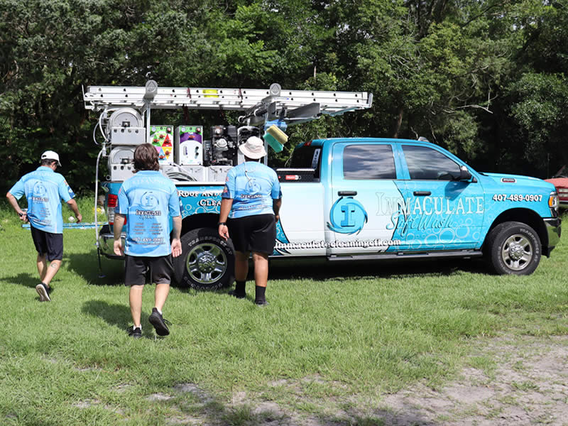our immaculate softwashing team doing work