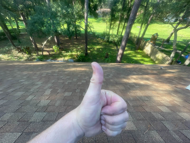 Ultimate Guide to Immaculate Soft Washing Roof Cleaning - Thumbs up for a job well-done